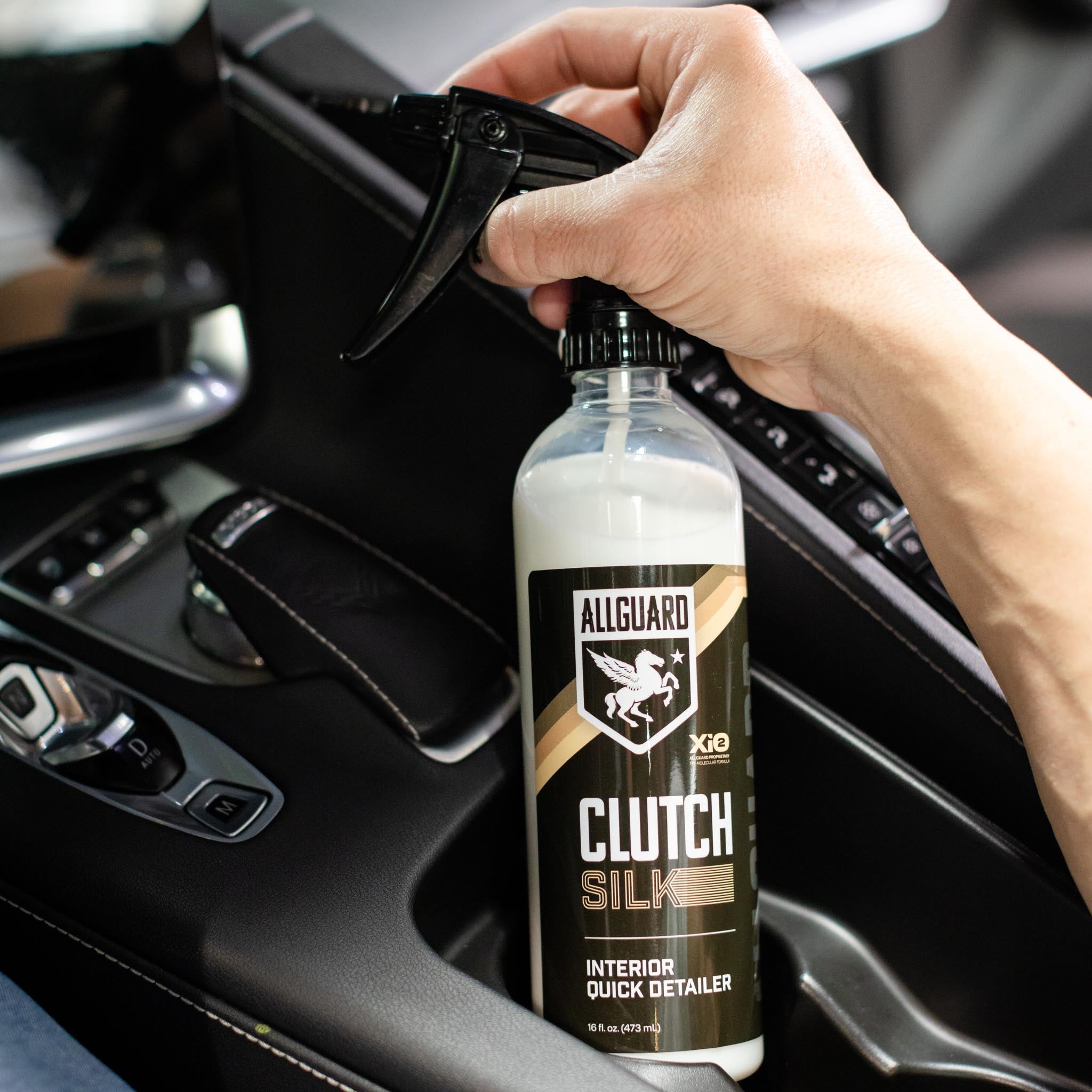 Clutch SILK interior car detailer spray bottle on center cup holder