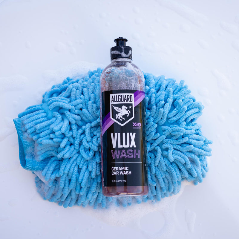 VLUX wash ceramic car wash resting on blue wash mitt
