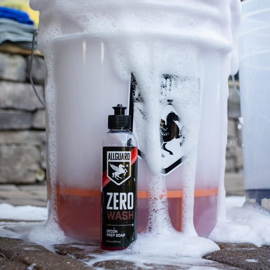 ZERO Wash bottle in front of bucket of soapy water